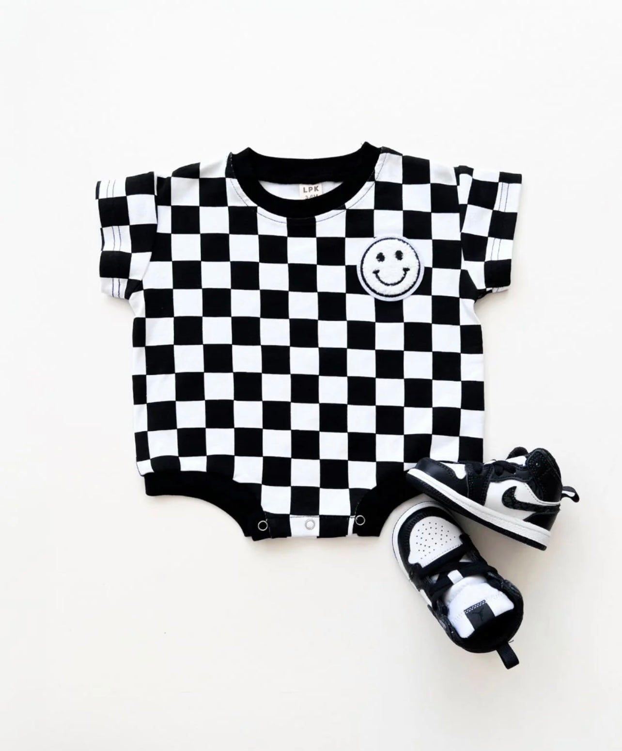 Checkered smiley | bubble romper