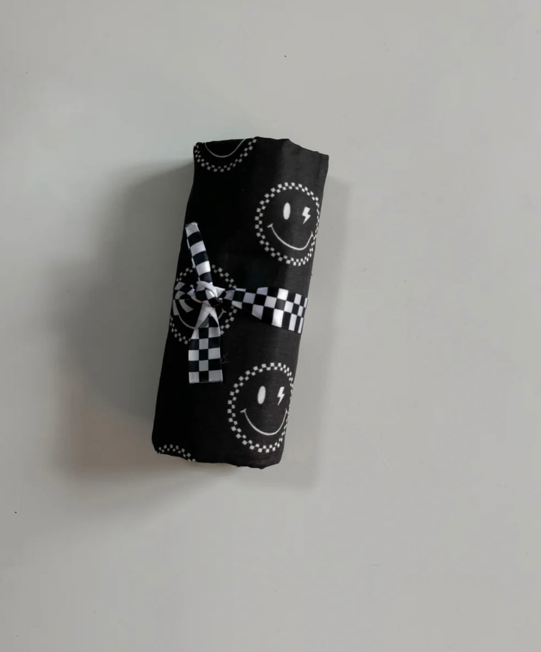 Checkered Smiley | muslin blanket